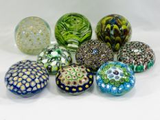 A collection of glass paperweights