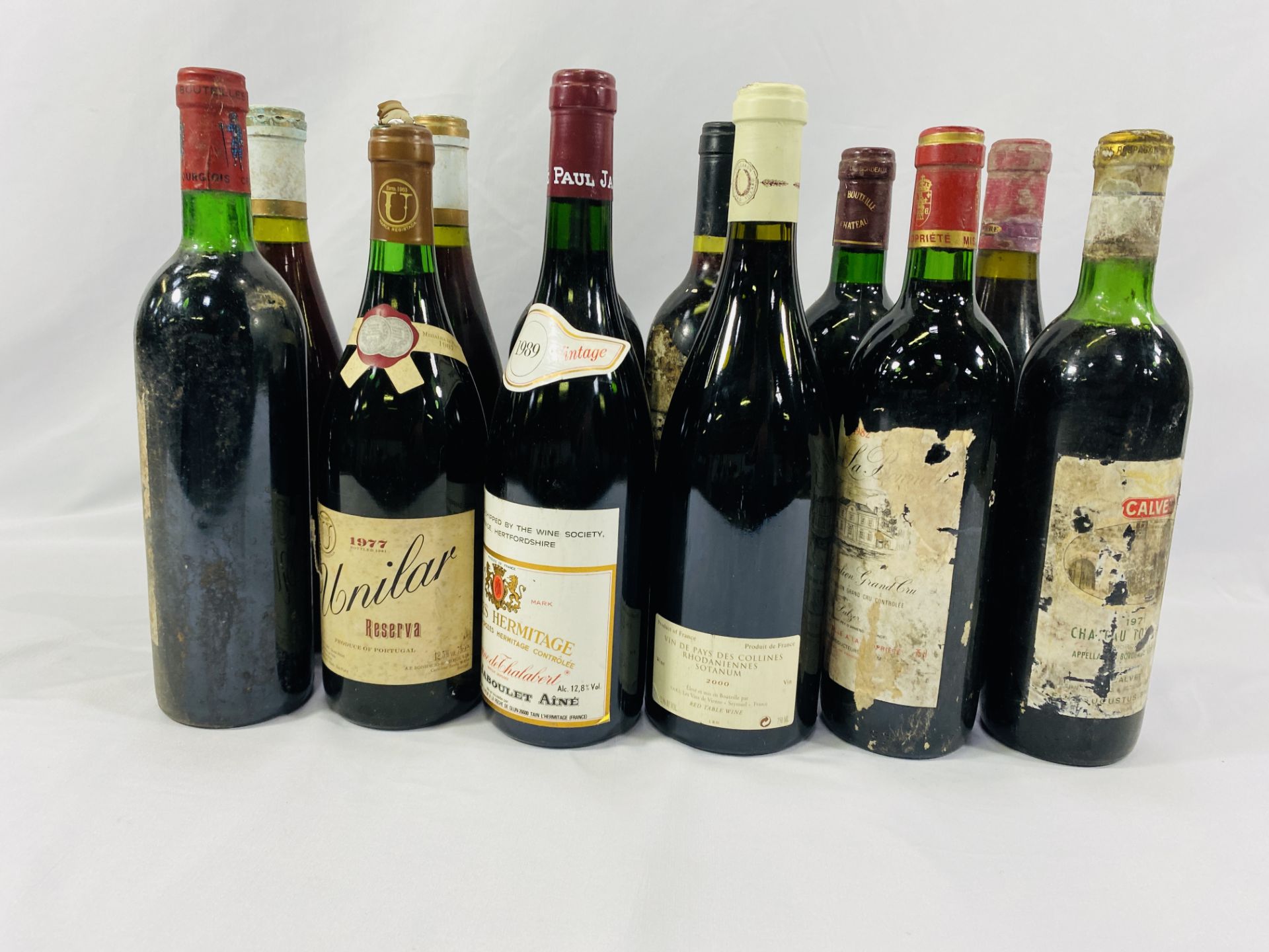 Twelve bottles of red wine