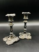 Pair of late Victorian silver candlesticks and a silver four footed epergne