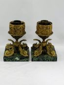 A pair of ormolu candlesticks