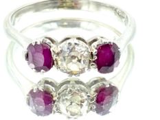 Platinum 3 stone ruby and diamond ring