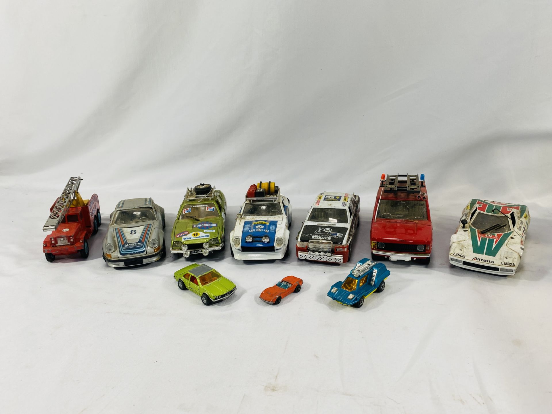 A quantity of die cast cars and lorries