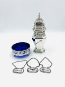 Large silver sugar caster, London 1865, a silver three footed coaster, and 3 silver decanter labels