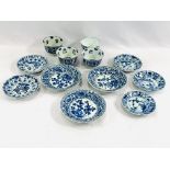 Four Oriental blue and white tea bowls together with eight saucers