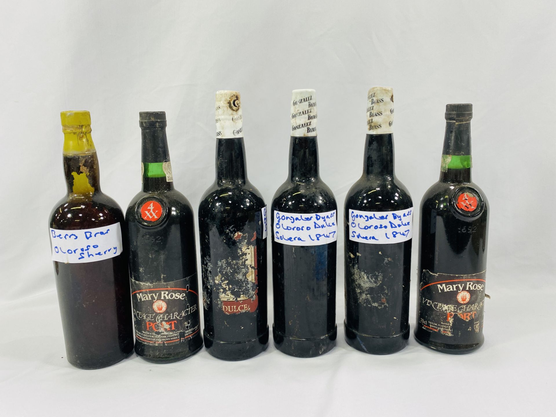 Four bottles of sherry and two of port