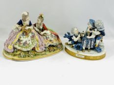 A Capodimonte figure and a continental porcelain figure