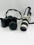 Minolta camera, a Canon camera and accessories