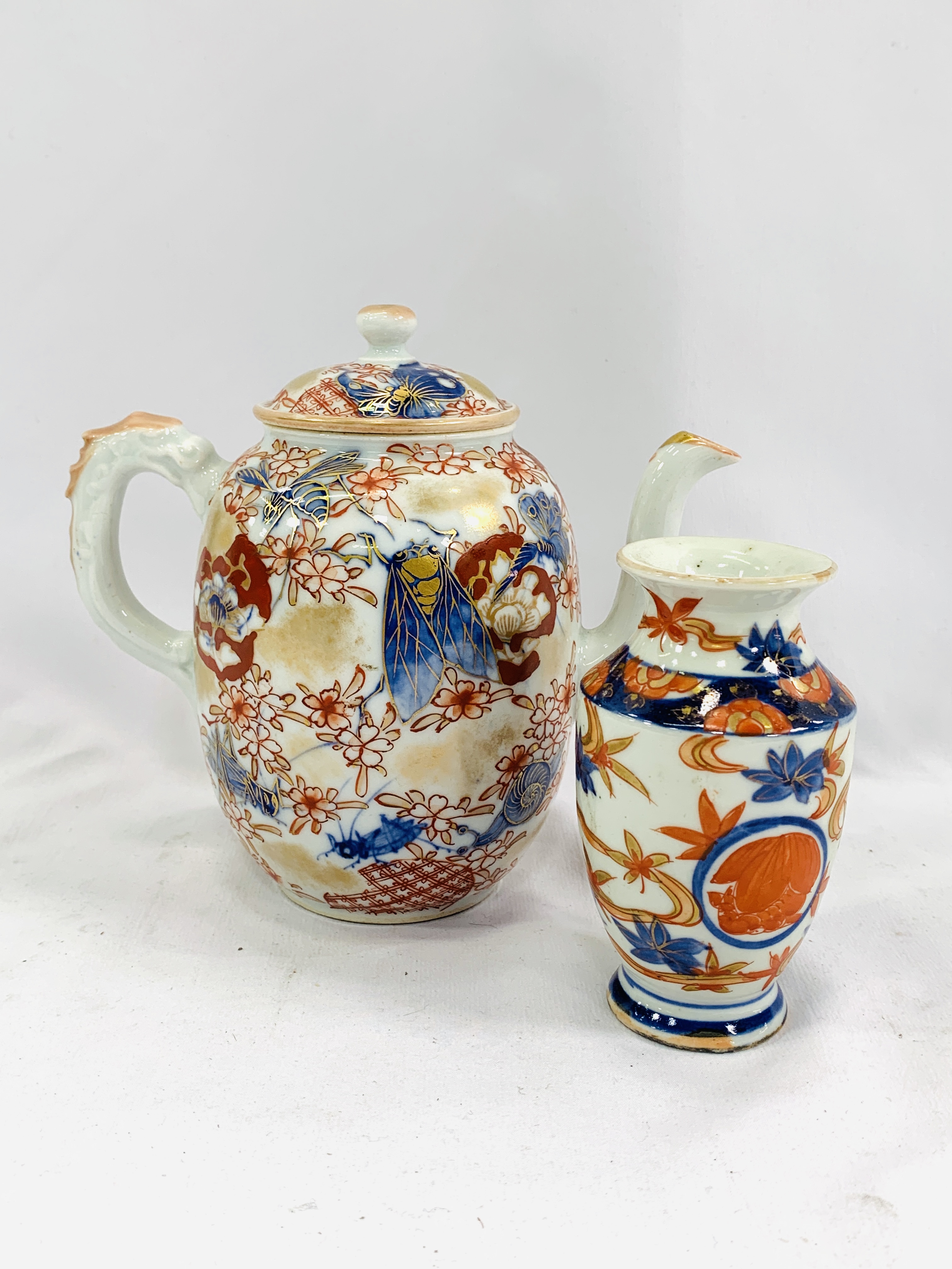 An Imari teapot and vase