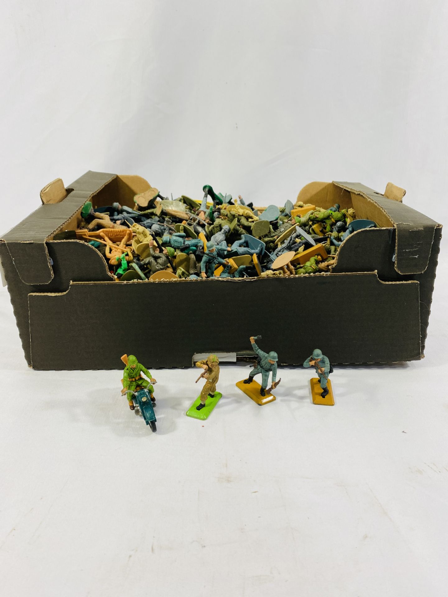 A quantity of toy soldiers, some by Britains Ltd