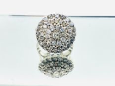 White gold and diamond cluster ring