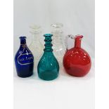 Five glass decanters