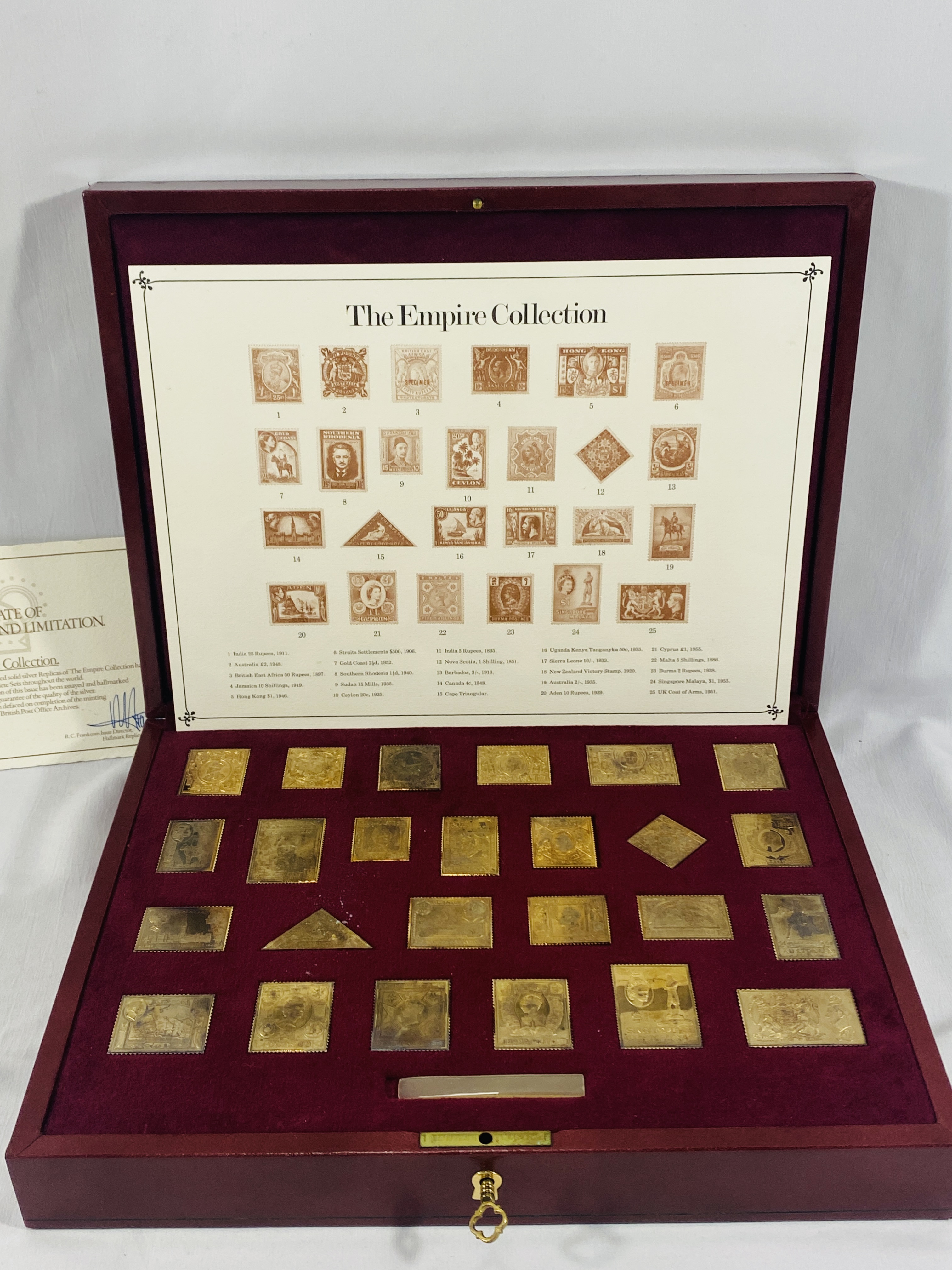 The Empire Collection' set of twenty-five gold plated sterling silver stamp replicas