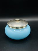 Light blue glass bowl with silver lid