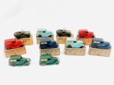 Nine Minic clockwork vehicles in boxes