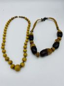 Two wood bead necklaces