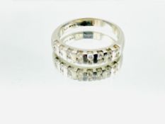 Platinum and diamond half eternity ring