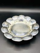 Silver shallow bowl with fluted sides on 4 scroll feet