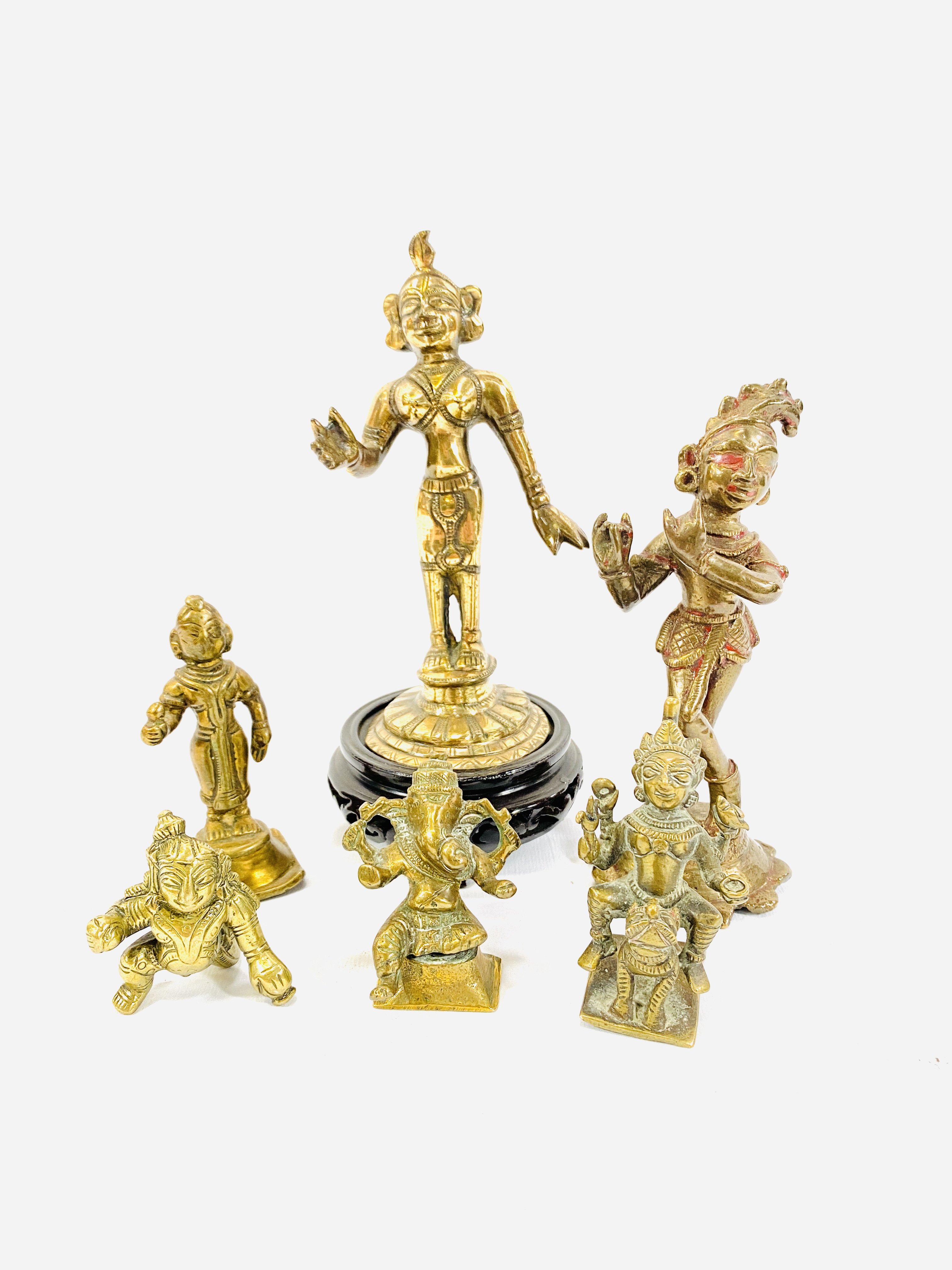 Six Oriental brass figures