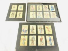 Set of eight hand painted Oriental figures on fabric