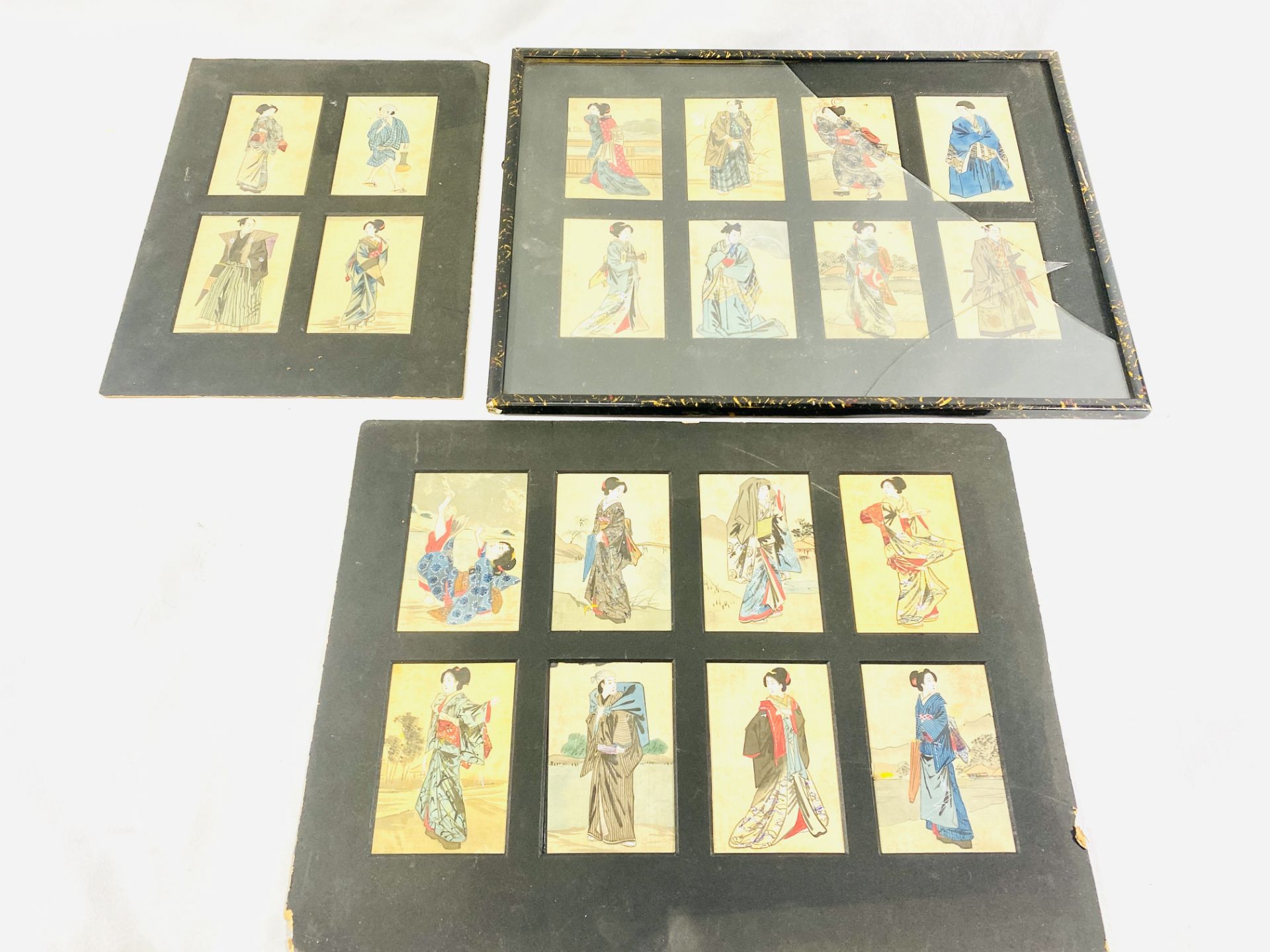 Set of eight hand painted Oriental figures on fabric