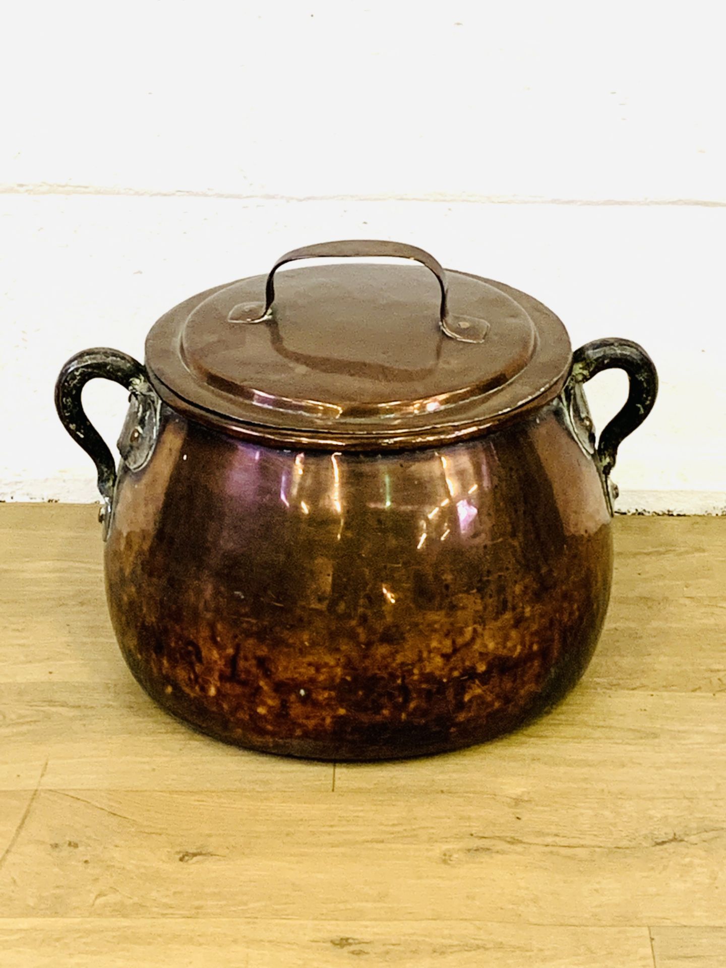 Copper pot with lid.