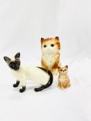 Two Beswick cats, together with a Melba ware cat