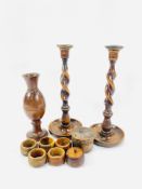 A pair of oak barley twist candlesticks and other items