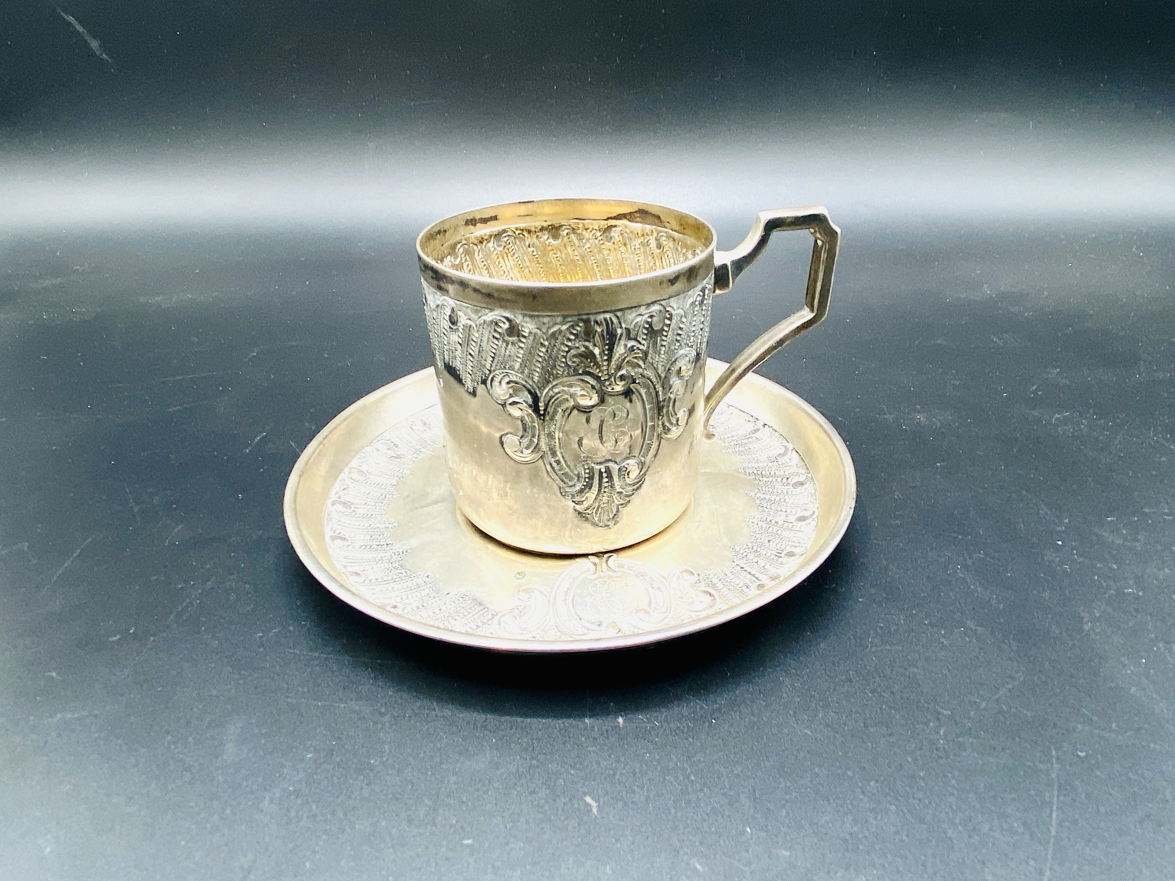 Continental 800 silver repousse decorated cup and saucer, and a silver goblet - Image 2 of 4