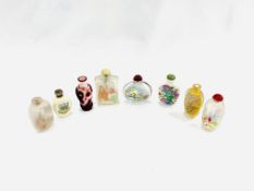 Eight Oriental snuff bottles