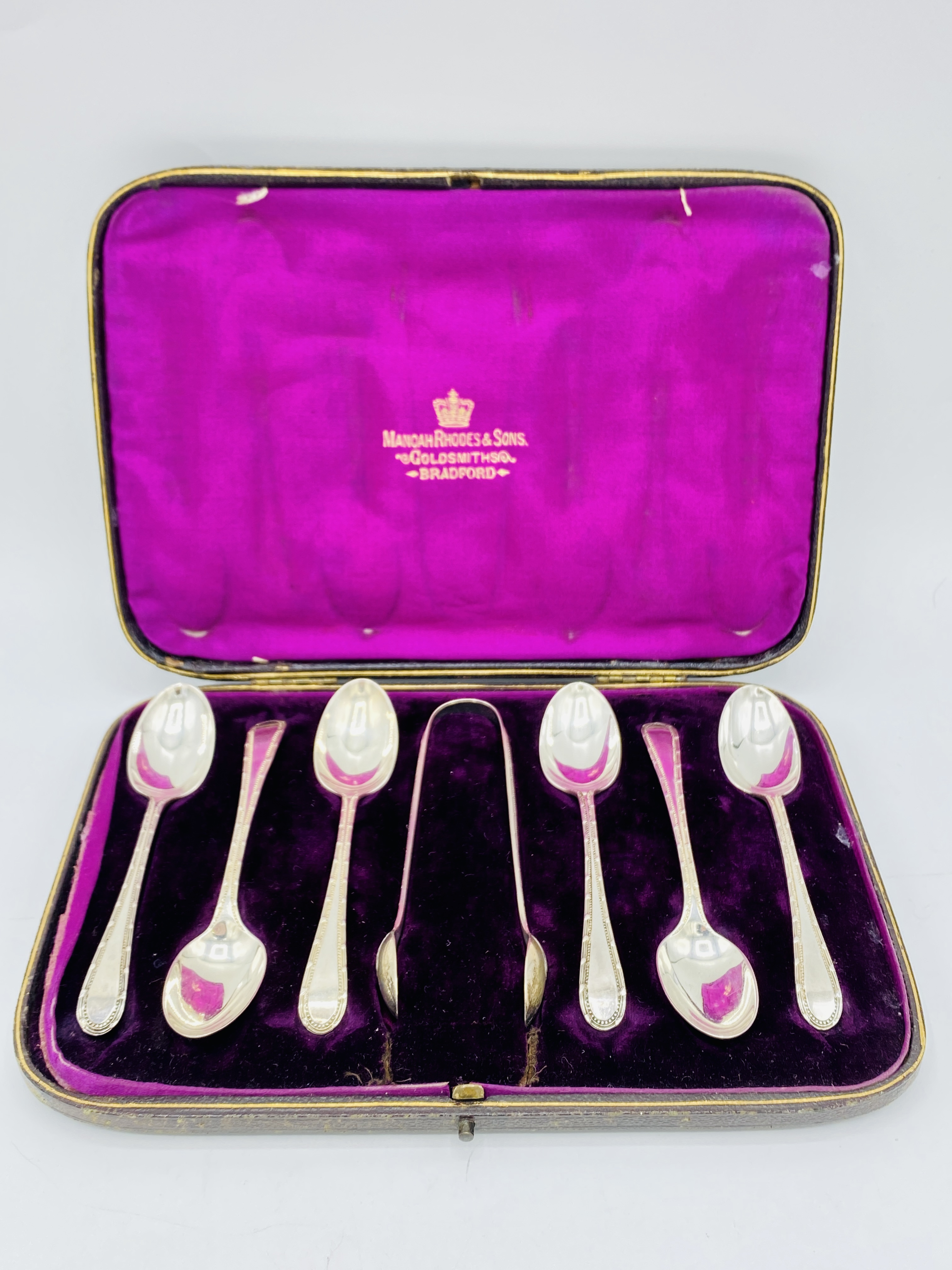 A set of 6 Georgian silver teaspoons, hallmarked London 1785, and another set