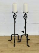 Pair of cast metal candlesticks