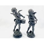 Two brass figures of cherubs