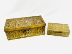 Two brass boxes