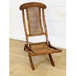 Folding chair with cane seat