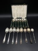 Set of silver coffee spoons together with other silver spoons