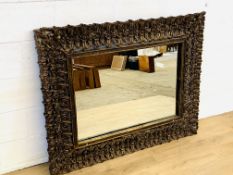 Carved wood frame mirror