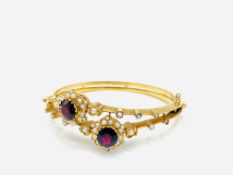 15ct gold bangle set with two garnets and pearls