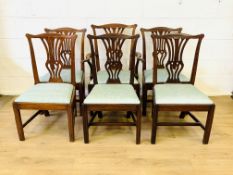 Five mahogany dining chairs