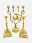 Brass candelabra together with a pair of brass candlesticks