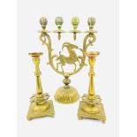 Brass candelabra together with a pair of brass candlesticks