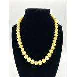 Single strand pearl necklace