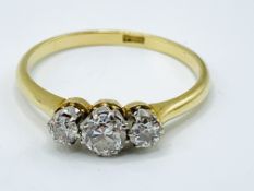 18ct gold and three diamond ring
