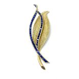 18ct gold brooch set with sapphires