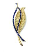 18ct gold brooch set with sapphires