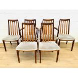 Six teak dining chairs