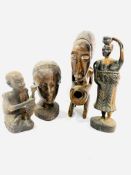 Four carved wood African figures
