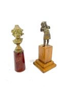 Two metal figures on wooden bases