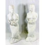 Two ceramic figures of mermaids
