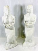 Two ceramic figures of mermaids