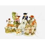 A collection of Staffordshire figures